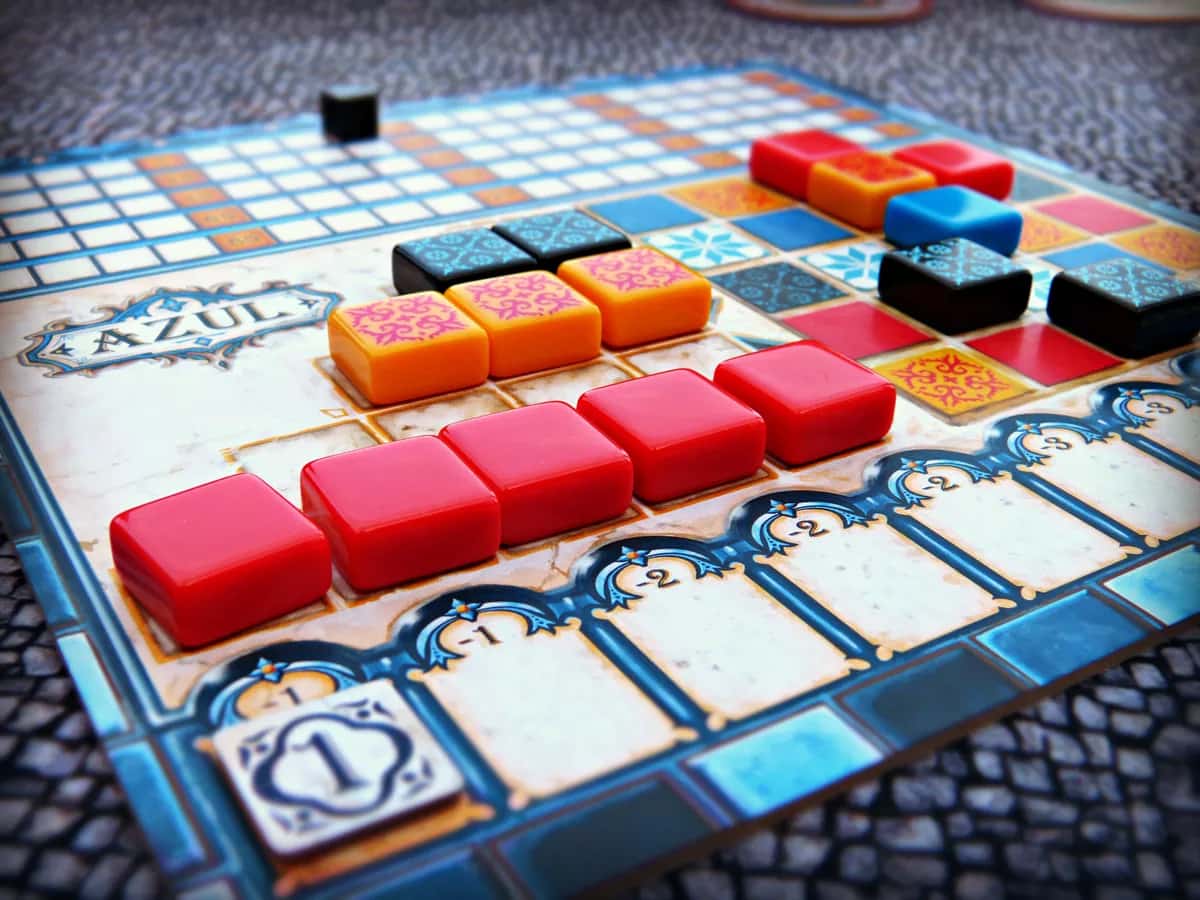 Azul board with five red tiles in bottom row